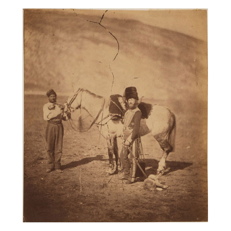  >Cornet John Yates, 11th Hussars, with groom, horse and dog, photographed in the Crimea by Roger Fenton. Click to enlarge.